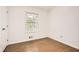 Cozy bedroom with new flooring, a closet, and a window at 4201 Regal Ridge Rd, Austell, GA 30106