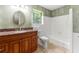 Bathroom with a vanity, toilet, and shower-tub combination at 6033 Morrow Cv, Morrow, GA 30260