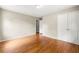 Bedroom with hardwood floors and large closets at 6033 Morrow Cv, Morrow, GA 30260