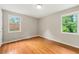 Bedroom with hardwood floors and natural light at 6033 Morrow Cv, Morrow, GA 30260