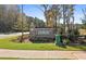 Welcoming Briar Creek community sign surrounded by lush landscaping and greenery at 6106 Marigold Way, Atlanta, GA 30349