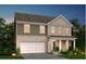 Charming two-story home with a brick and siding exterior, covered porch, and two-car garage at 6106 Marigold Way, Atlanta, GA 30349