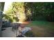 Cozy patio with outdoor seating, landscaping, and a beautiful view of the greenery at 70 Darbys Crossing Ct, Hiram, GA 30141