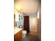 Well-appointed bathroom featuring modern fixtures, vanity with storage, and a shower-tub combination at 70 Darbys Crossing Ct, Hiram, GA 30141
