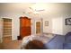 Bedroom boasts natural light, ceiling fan, and opens to a bathroom for added convenience at 70 Darbys Crossing Ct, Hiram, GA 30141