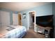 Spacious bedroom offering access to the bathroom and an additional room, providing convenience and versatility at 70 Darbys Crossing Ct, Hiram, GA 30141