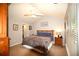 Cozy bedroom featuring neutral walls, carpet, and a ceiling fan, providing a relaxing atmosphere at 70 Darbys Crossing Ct, Hiram, GA 30141