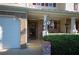 Charming front porch with brick accents, decorative lanterns, and a welcoming entryway at 70 Darbys Crossing Ct, Hiram, GA 30141