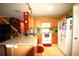 Functional kitchen with a breakfast bar, ample cabinetry, and stainless steel appliances at 70 Darbys Crossing Ct, Hiram, GA 30141