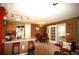 Bright living room with breakfast bar, French doors to patio and an adjacent dining area at 70 Darbys Crossing Ct, Hiram, GA 30141
