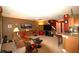 Bright living room with a kitchen, dining area, and a comfortable seating area with a TV at 70 Darbys Crossing Ct, Hiram, GA 30141