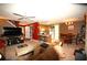 Open-concept living room featuring a kitchen with bar seating and dining area at 70 Darbys Crossing Ct, Hiram, GA 30141