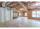 Large unfinished basement area with exposed ceiling and framing, ready for customization at 1410 Eastland Rd Se Rd, Atlanta, GA 30316