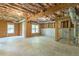 Spacious unfinished basement featuring exposed insulation, framing, and potential for customization at 1410 Eastland Rd Se Rd, Atlanta, GA 30316