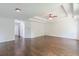 This spacious bedroom features hardwood floors and a tray ceiling with ceiling fan at 1410 Eastland Rd Se Rd, Atlanta, GA 30316