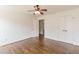 Bedroom with hardwood floors features a ceiling fan and a double-door closet for storage at 1410 Eastland Rd Se Rd, Atlanta, GA 30316
