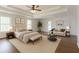 Serene main bedroom with a sitting area, large windows, and a comfortable king-size bed at 1410 Eastland Rd Se Rd, Atlanta, GA 30316