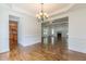 Dining room with hardwood floors boasts an open design leading to living room and kitchen at 1410 Eastland Rd Se Rd, Atlanta, GA 30316