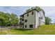 Side exterior view showcasing the three-story building and multi-level decks at 1410 Eastland Rd Se Rd, Atlanta, GA 30316