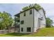 Side and rear exterior view of a home with a well-kept lawn at 1410 Eastland Rd Se Rd, Atlanta, GA 30316