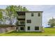 Exterior view of a multi-level home with balconies overlooking the yard and neighborhood at 1410 Eastland Rd Se Rd, Atlanta, GA 30316