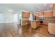 Spacious kitchen featuring stainless steel appliances, granite counters, and a center island with breakfast bar at 1410 Eastland Rd Se Rd, Atlanta, GA 30316