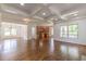 Spacious living room featuring hardwood floors, an open floor plan, recessed lighting and large windows providing natural light at 1410 Eastland Rd Se Rd, Atlanta, GA 30316