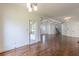 Bright living room with hardwood floors, coffered ceilings, and an open floor plan at 1410 Eastland Rd Se Rd, Atlanta, GA 30316