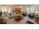 Living room area featuring hardwood flooring with furniture arrangement and dining and kitchen areas at 1410 Eastland Rd Se Rd, Atlanta, GA 30316