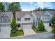 Aerial view of a neighborhood showcasing well-maintained homes with manicured lawns and tree-lined streets at 550 Constellation Overlook Sw, Atlanta, GA 30331