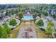An aerial view of a neighborhood with a pool, clubhouse, and playground at 550 Constellation Overlook Sw, Atlanta, GA 30331