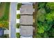 Overhead view capturing home rooftops and green spaces, blending with a residential street and surrounding nature for serene living at 550 Constellation Overlook Sw, Atlanta, GA 30331