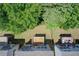 An aerial view of townhomes with wooden decks in a neighborhood surrounded by lush greenery at 550 Constellation Overlook Sw, Atlanta, GA 30331