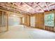 Spacious unfinished basement offering potential for customization with framed walls, insulation, and exterior access at 550 Constellation Overlook Sw, Atlanta, GA 30331