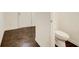 A well-maintained half bathroom with attractive wood floors and modern fixtures at 550 Constellation Overlook Sw, Atlanta, GA 30331