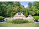 Cascades neighborhood entrance with stone sign and manicured landscaping at 550 Constellation Overlook Sw, Atlanta, GA 30331