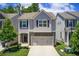 Charming two-story home with stone accents, attached two-car garage and nicely landscaped front yard at 550 Constellation Overlook Sw, Atlanta, GA 30331