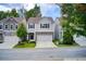 Charming two-story home featuring a light gray exterior, a two-car garage, and a well-maintained front yard at 550 Constellation Overlook Sw, Atlanta, GA 30331