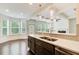 Bright kitchen with stainless steel appliances, an island and breakfast bar offering ample counter space at 550 Constellation Overlook Sw, Atlanta, GA 30331