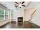 Cozy living room with fireplace, built-in shelves, hardwood floors and coffered ceiling at 550 Constellation Overlook Sw, Atlanta, GA 30331