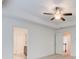 Main bedroom with ceiling fan and entrances to the bathroom and hallway at 550 Constellation Overlook Sw, Atlanta, GA 30331