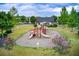 Community playground with slides and climbing structures, perfect for Gathering fun at 550 Constellation Overlook Sw, Atlanta, GA 30331