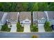 Overhead shot showcasing charming two-story homes with well-maintained lawns and driveways, offering a desirable neighborhood lifestyle at 550 Constellation Overlook Sw, Atlanta, GA 30331