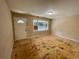 Inviting living room with a large window and convenient front door access at 6106 Oak Hill Sw Dr, Austell, GA 30168
