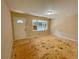 Bright living room featuring a window letting in natural light, awaiting your personal touch at 6106 Oak Hill Sw Dr, Austell, GA 30168