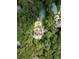 Stunning aerial view of estate featuring lush landscaping, private pool, tennis court, and elegant home at 70 Finch Forest Trl, Atlanta, GA 30327