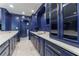 Basement bar area with built-in cabinets and a sink at 70 Finch Forest Trl, Atlanta, GA 30327