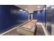 Basement game room features a shuffleboard table and recessed lighting at 70 Finch Forest Trl, Atlanta, GA 30327