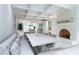 Dining area with a fireplace, built-in cabinets, tile floors, and access to the kitchen at 70 Finch Forest Trl, Atlanta, GA 30327