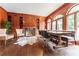 Dining room with wood paneling, fireplace, built-in cabinets, and bench seating at 70 Finch Forest Trl, Atlanta, GA 30327